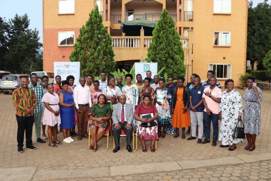 Participants pose for a group photo after the policy dialogue