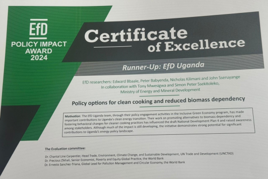 EfD-Uganda's Certificate of Excellence award during the 18th Annual General Meeting in Nairobi Kenya