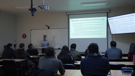 In the picture, Marc presents at the seminar series of Universidad de Talca's School of Business and Economics. Students from the PhD in Economics program attend the session.