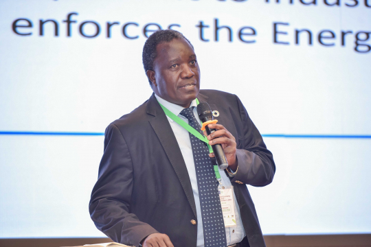 Sylvester Makaka delivers a keynote address on energy efficiency in the industrial sector.