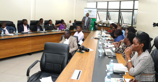  Edward Bbaale speaking to participants in the ministry boardroom.
